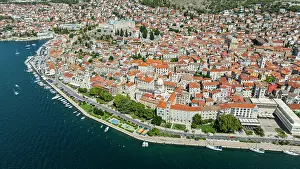 Streets Prints: Aerial view of Sibenik showing historic buildings and waterfront activities in Croatia