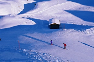 Holidaying Prints: Aerial view of skiers and alpine hut