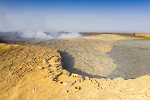 Volcanic Terrain Prints: Aerial view of stone huts on top of majestic Erta Ale volcano, Danakil Depression