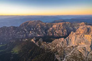 Aerial view of sunset over Tires Valley in autumn, Dolomites, South Tyrol, Italy, Europe