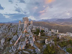 Autumnal Prints: Aerial view taken by drone of Rocca Calascio castle during an autumn sunrise