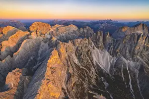 Rosengarten Prints: Aerial view of Torri Del Vajolet and Catinaccio Group lit by the autumn sunset, Dolomites