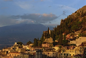 Mount Etna Prints: Aerial view over town of Taormina at dusk