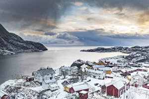 Nordland County Gallery: Aerial view of traditional wood houses covered with snow in winter, Nusfjord, Nordland county