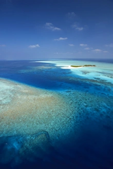 Aerial view of tropical island and lagoon, Maldives, Indian Ocean, Asia