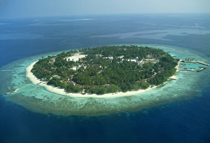 Atoll Prints: Aerial view of a tropical island in the Maldive Islands