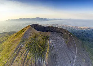 Aerial view of Vesuvius crater and Gulf of Naples at sunrise, Naples, Campania, Italy