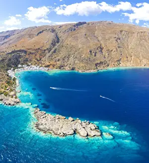 Loutro Prints: Aerial view of the village of Loutro nestled in the idyllic cove washed by turquoise sea