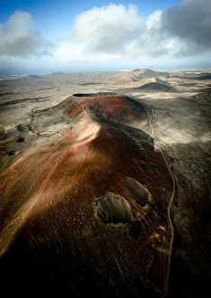 Corralejo Prints: Aerial view of volcanoes at dawn