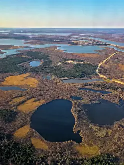 Ecology Prints: Aerial view of wetlands and lakes in the Arctic region of Russia during daylight hours in autumn