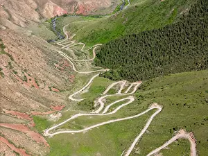 Outdoor Exploration Prints: Aerial view of the winding mountain road at Kalmak-Ashu Pass
