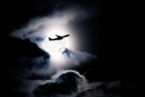 Images Dated 15th July 2009: Aircraft taking off from Heathrow passing in front of full moon, London