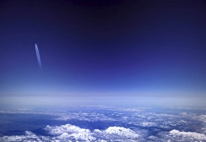 Airborne Prints: Aircraft vapour trails above clouds over Colorado