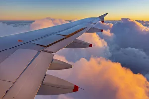Airplane Prints: Airplane wing at sunset over clouds, Italy, Europe