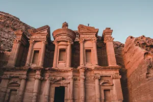 Al Deir Prints: Al Deir (Monastery) facade at sunset with some people on top of it