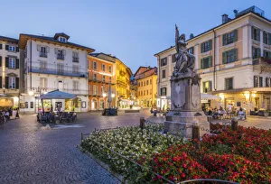 Piazza Prints: Al Fresco restaurants in Piazza Daniele Ranzoni at dusk, Intra, Verbania, Province