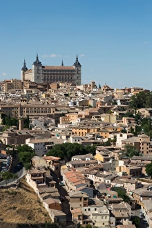 Castilla La Mancha Prints: The Alcazar towering above the rooftops of Toledo