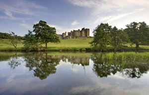 Images Dated 28th June 2009: Alnwick Castle reflecting in River Aln, Alnwick, Northumberland, England
