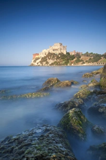 14th Century Gallery: Alongside a picturesque millstone, atop a rocky promontory dominating the sea
