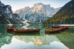 Rowing Boat Prints: Alpine lake of Braies, Pragser Wildsee in Trentino Alto Adige at dawn