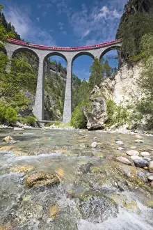Alpine stream below the Bernina Express train on Landwasser Viadukt, Filisur, Albula Valley