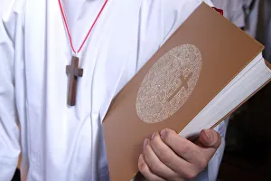 Kids Prints: Altar boy with Holy Bible during Catholic Mass, Haute-Savoie, France, Europe