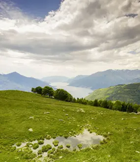 Lake Como Prints: Alto Lario and Lake Como seen from green meadows of Montemezzo mountains, Lombardy