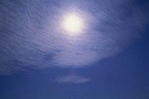 Altocumulus clouds in front of the sun, high above Tadley, near Basingstoke