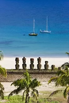 Images Dated 17th March 2008: Anakena beach, yachts moored in front of the monolithic giant stone Moai statues of Ahu Nau Nau
