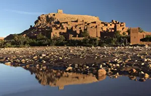 Defence Prints: The ancient Kasbah Ait Benhaddou bathed in morning light and reflecting in river