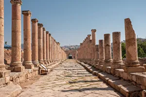 Colonnade Prints: Ancient Roman stone road with a colonnade, Jerash, Jordan, Middle East