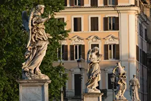 Male Representation Prints: Angel statues on Ponte Sant Angelo with grand house behind, Rome, Lazio, Italy, Europe