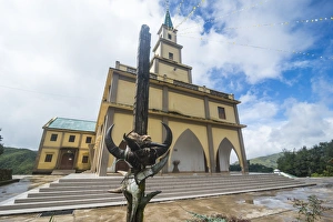 Religious Offering Prints: Animal fetish in front of the Church of St. Matthew, Maubisse, East Timor, Southeast Asia