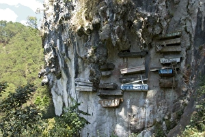 Hung Prints: Animist hanging coffins still in use today, on limestone cliff in Echo Valley