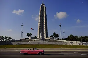 Vintage Car Prints: Antique car drives by Jose Marti Monument in Plaza de la Revolucion (Revolution Square)