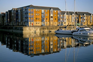 Apartments and reflection in water