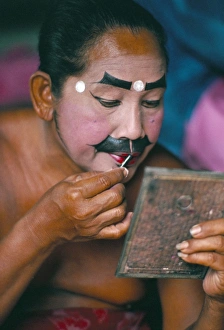 Applying make-up for the Barong classical dance Applying make-up for the Barong classical dance