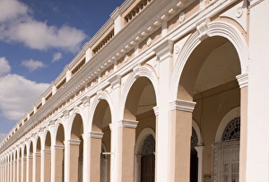 Cienfuego Prints: An arcade on a building near Parque Marti in Cienfuegos, Central Cuba, Cuba