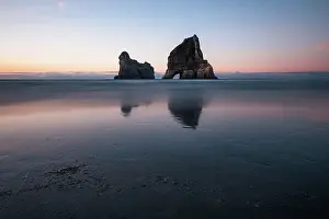 Zealand Prints: Archway Islands stand against twilight sky at Wharariki Beach in Golden Bay