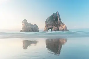 Zealand Prints: Archway Islands at Wharariki Beach under soft morning light in Golden Bay New Zealand