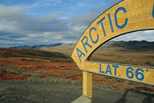 Arctic Circle Prints: Arctic Circle crossing point on road across tundra, Dempster Highway, Yukon, Canada