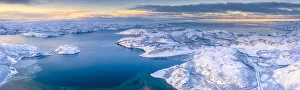 Arctic Gallery: Arctic sunrise over the frozen sea and mountains covered with snow, Laksefjorden, Lebesby