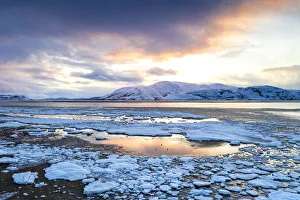 Arctic Gallery: Arctic sunset on snow capped mountains and frozen sea, Tanamunningen Nature Reserve