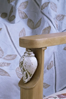 New Delhi Prints: Detail of the arm of a drawing room chair in new build home