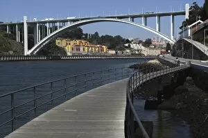 Images Dated 19th July 2010: The Arrabida Bridge, designed by Edgar Cardoso, spans the River Douro between Vila Nova de Gaia