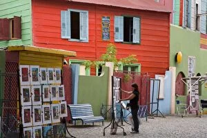 Art vendor on El Caminito street in La Boca District of Buenos Aires, Argentina
