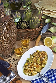 Artichokes and bottarga (botargo) (cured fish roe), a Mediterranean delicacy from Sardinian cooking Artichokes and bottarga (botargo) (cured fish roe), a Mediterranean delicacy from Sardinian cooking