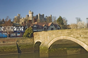 Images Dated 16th February 2008: Arundel Castle from across tidal inlet with town bridge with half timbered town houses