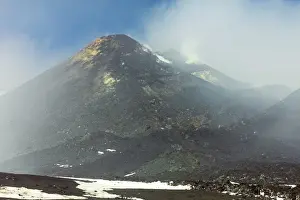 Mount Etna Prints: Ash, rock and sulphur at the smoking summit of 3350m high volcano Mount Etna during an active phase