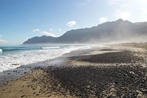 Seashore Prints: Atlantic Ocean coast beach and waves with morning sea mist